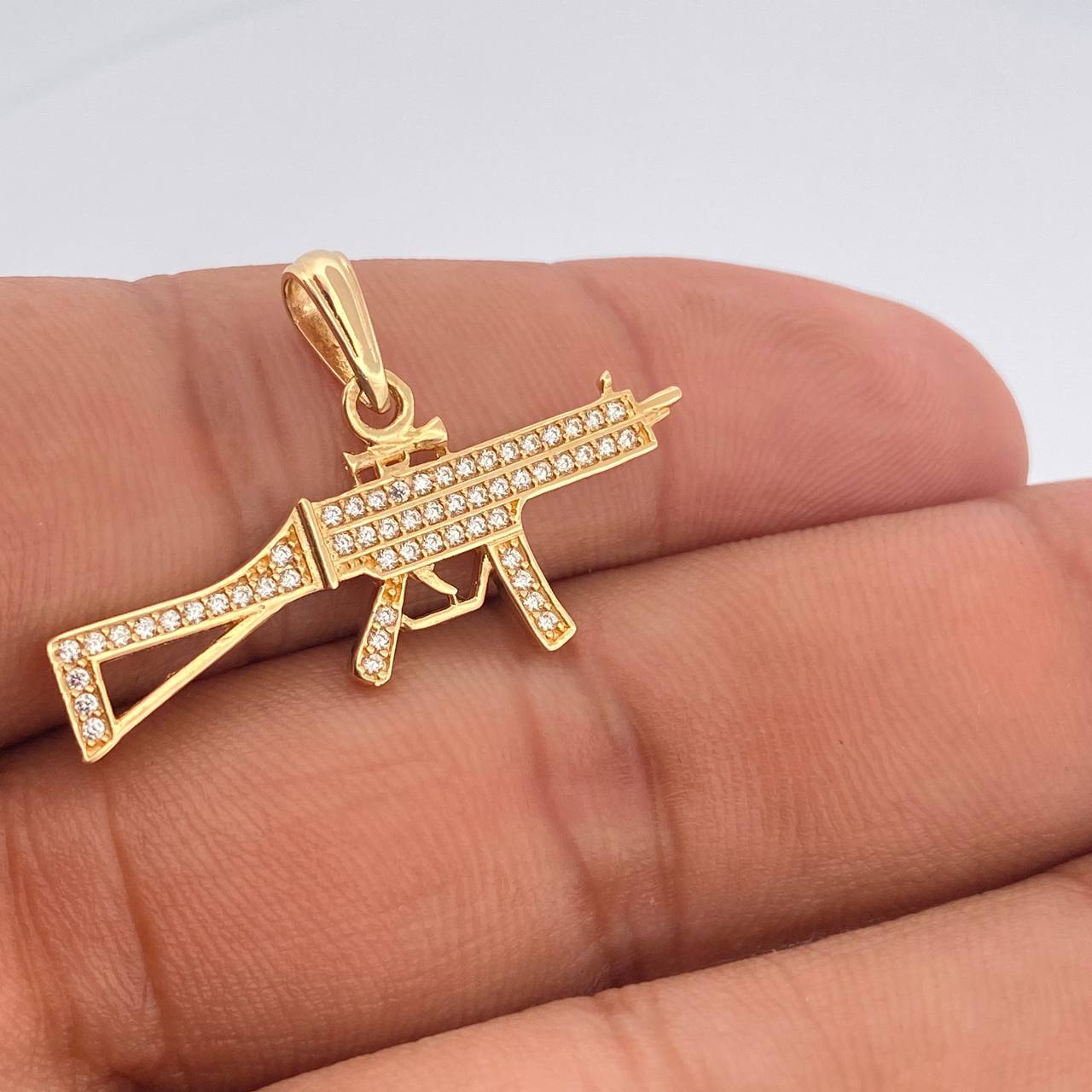 Dije Arma 2.5gr / 2.3cm / Oro Amarillo 18K $