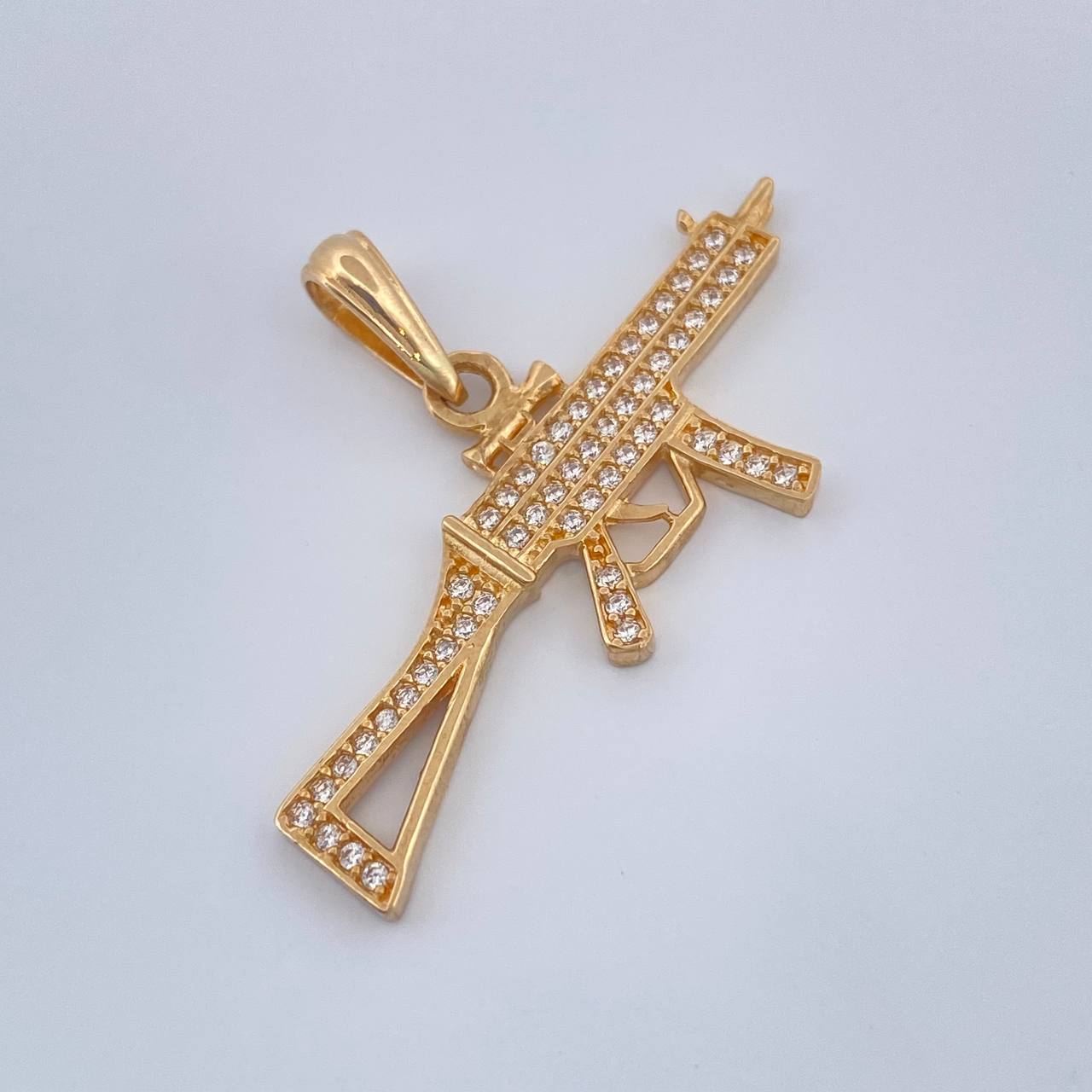 Dije Arma 2.5gr / 2.3cm / Oro Amarillo 18K $