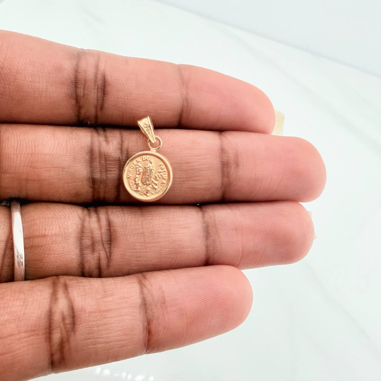 Dije Virgen de Fatima 0.55gr / 1.6cm / Oro Amarillo 18K %