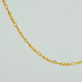 Cadena Figaro 1.8gr / 60cm / 1.55mm Oro Amarillo +1 18K $