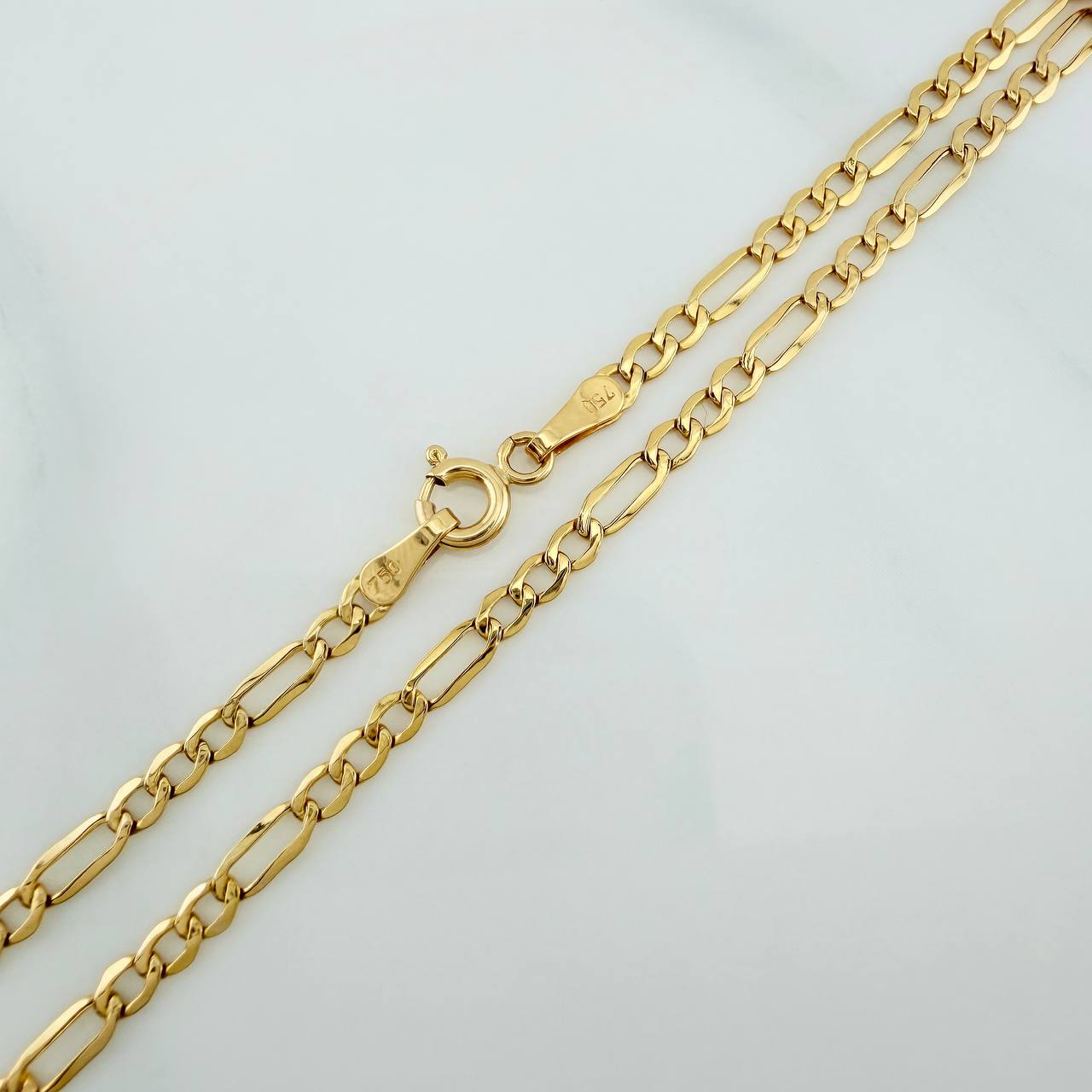Pulso Figaro 1.2gr / 20.1cm / 2.55mm Oro Amarillo +1 18K $
