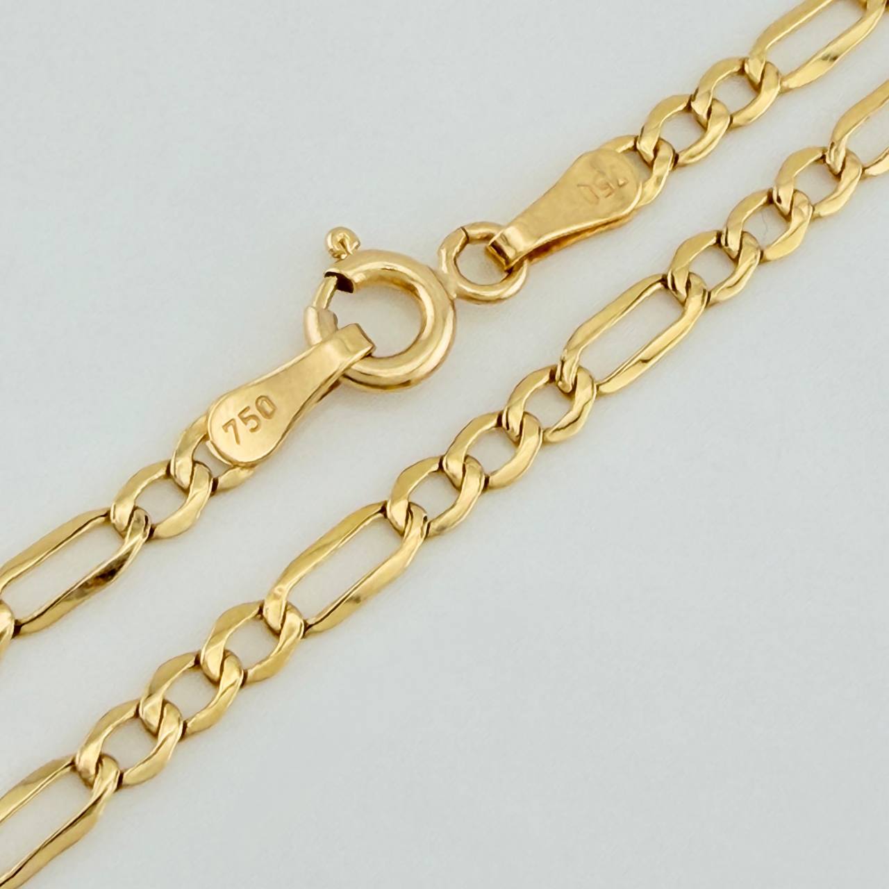 Pulso Figaro 1.2gr / 20.1cm / 2.55mm Oro Amarillo +1 18K $