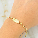 Pulso Bebé GC Placa Nube Divino Niño 1.85gr / 14.5cm / 3.6mm Oro Amarillo 18K ©