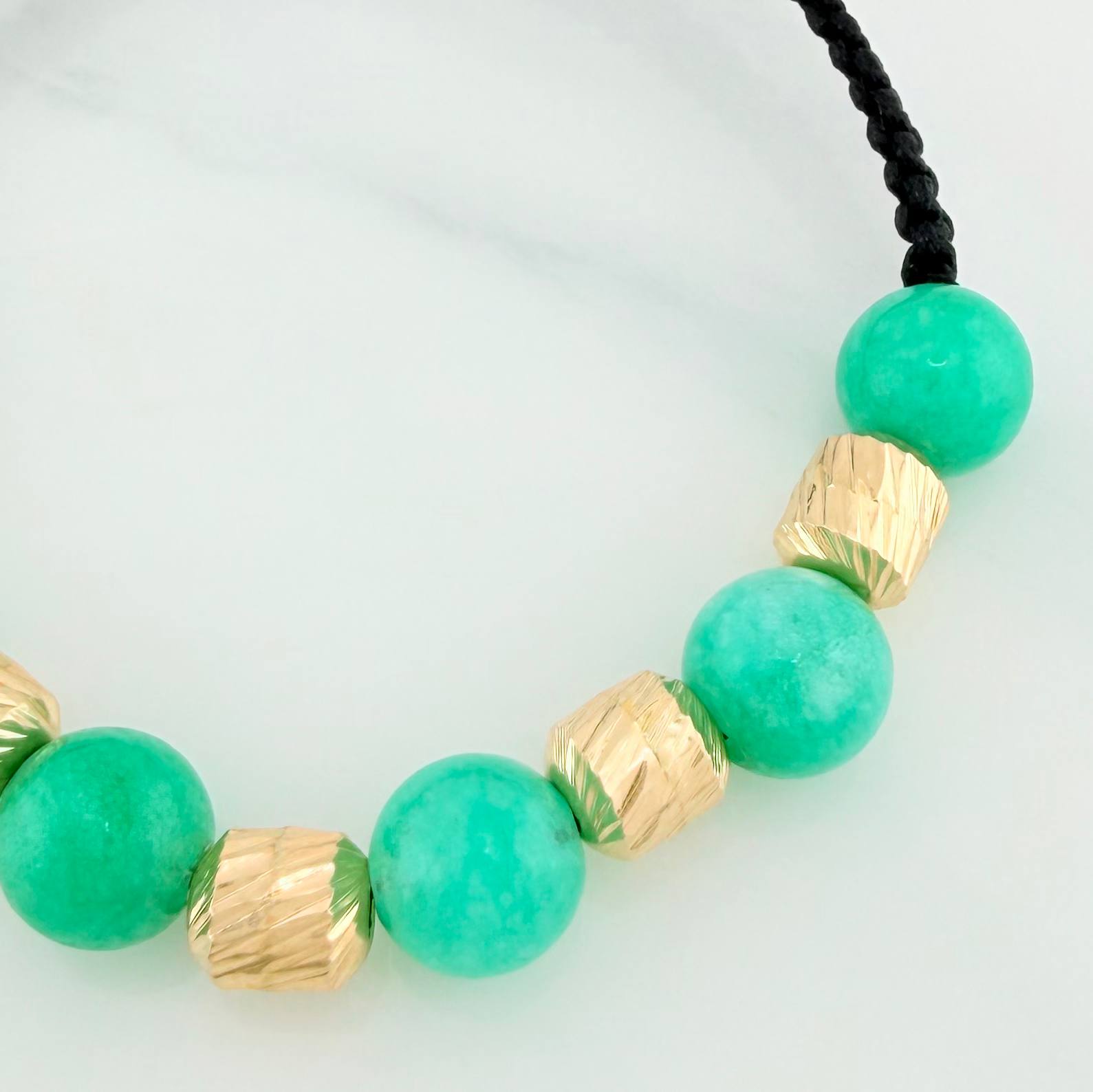 Pulsera Tejida Negra Morralla Esmeralda 6 Und / 6Mm Oro Amarillo 18K