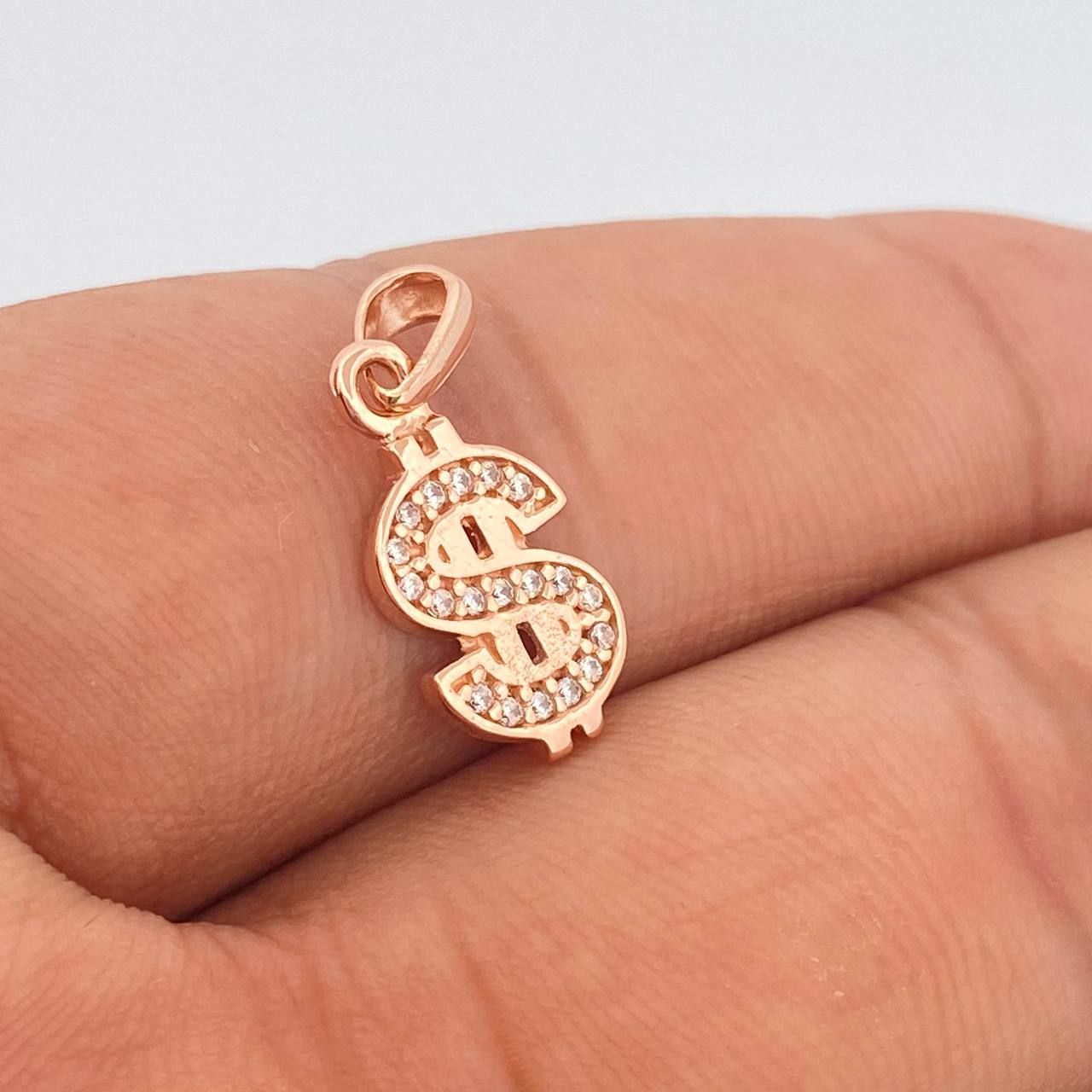 Dije Signo Peso 1.4gr / 2cm / Oro Rosa 18K $