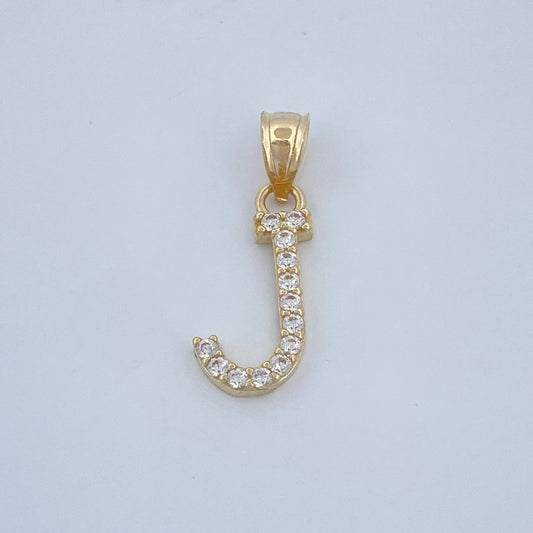 Dije J 0.6gr / 2cm / Oro Amarillo 18K $