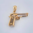 Dije Pistola 11.85gr / 3.4cm / Dos Oros Amarillo Blanco 18K $