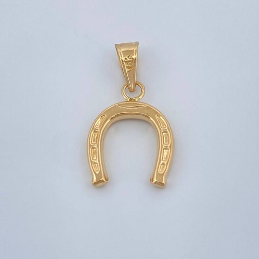 Dije Herradura 0.65gr / 2cm / Oro Amarillo 18K %
