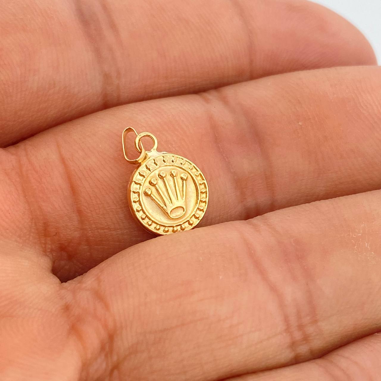 Dije Corona RX 0.5gr / 1.6cm / Oro Amarillo 18%