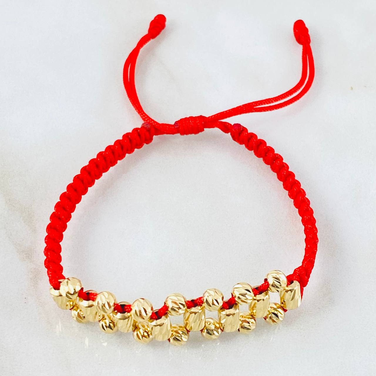 Pulsera Roja Bolas Cilindros 2.7gr / 4mm Oro Amarillo 18K ©