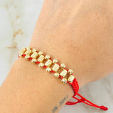 Pulsera Roja Bolas Cilindros 2.7gr / 4mm Oro Amarillo 18K ©