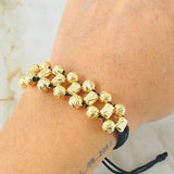 Pulsera Negra Bolas Cilindros 4.75gr / 6mm Oro Amarillo 18K ©