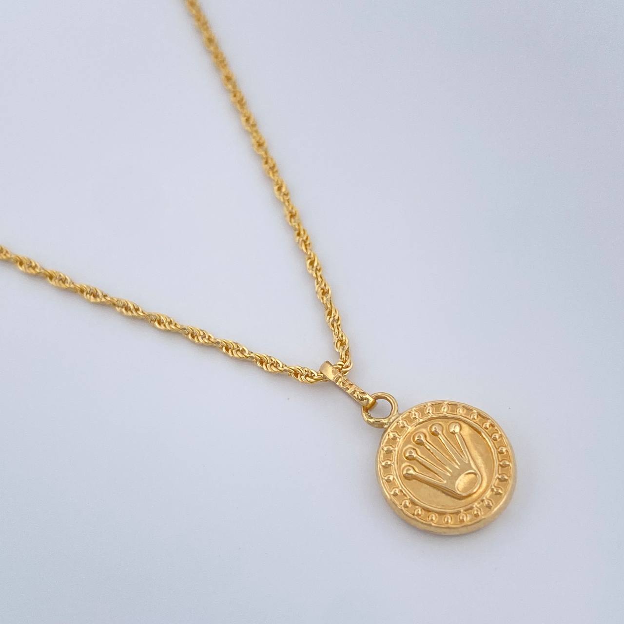 Set Cadena y Dije Lazo + Corona 1.5gr / 44.6cm / 1mm Oro Amarillo 18K (Oferta) %