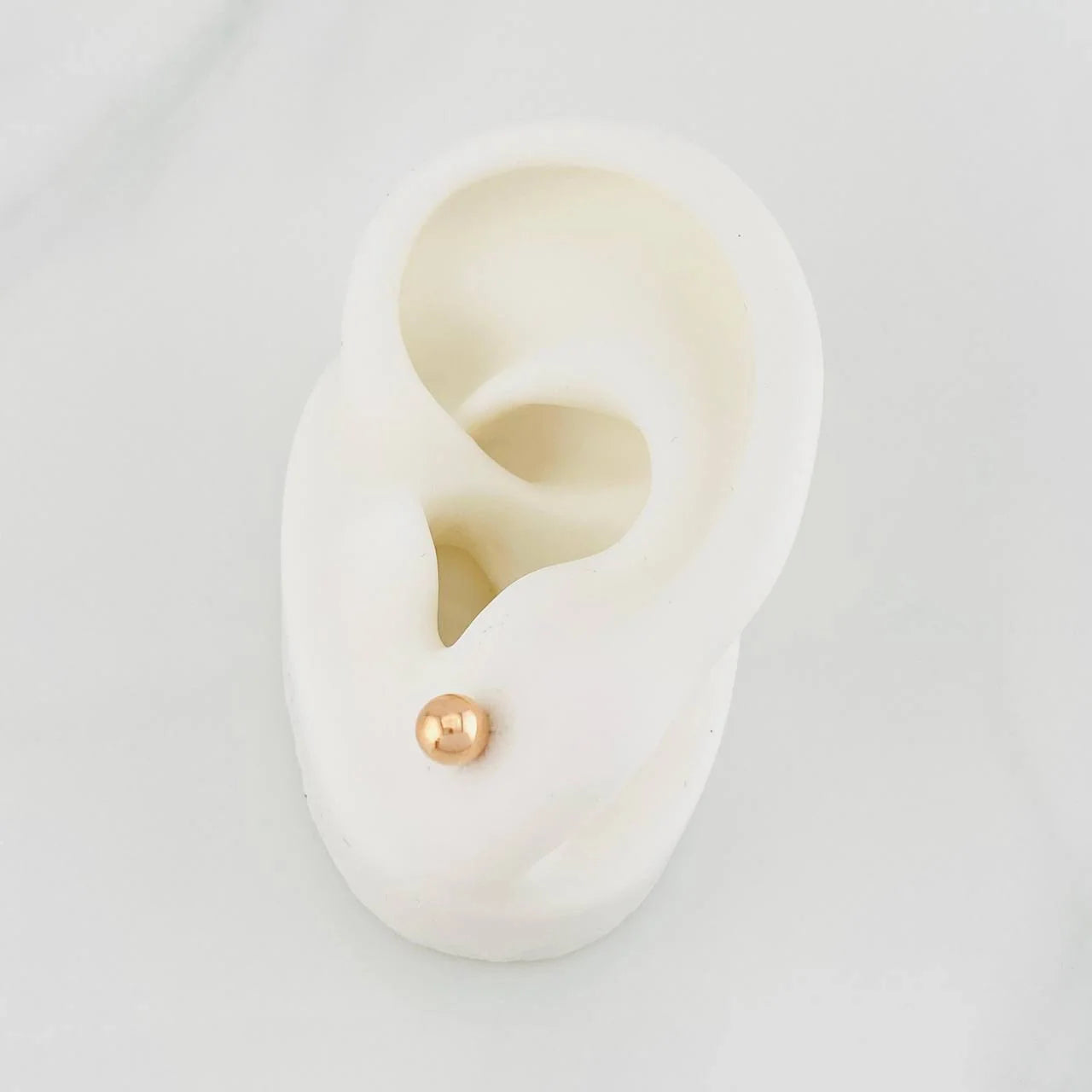 Topos Bola Lisa 0.5g / 5mm Oro Rosa 18K