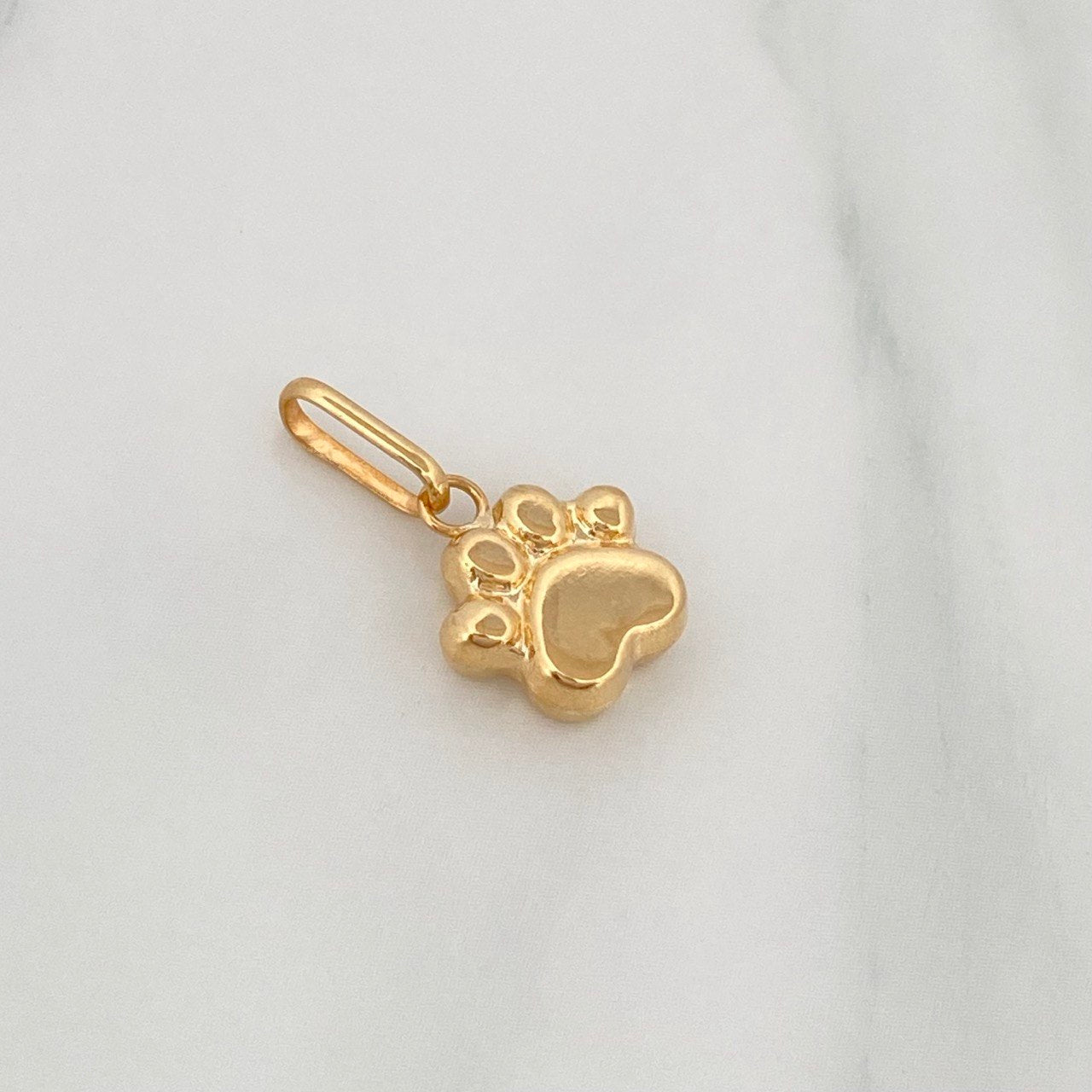 Dije Huella 0.65 g / 1.8 cm Oro Amarillo 18K