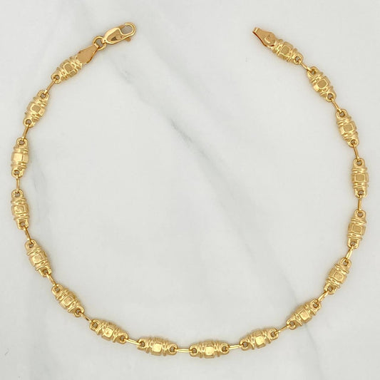 Tobillera Rustico Barril 5.1 g / 25.7 cm / 4.69 mm Oro Amarillo 18K