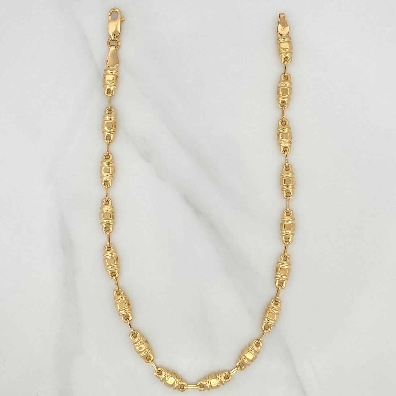 Tobillera Rustico Barril 5.1 g / 25.7 cm / 4.69 mm Oro Amarillo 18K