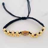 Pulsera Tejida Cruz Cristo Milagroso de Buga Cuatro Oros 18K