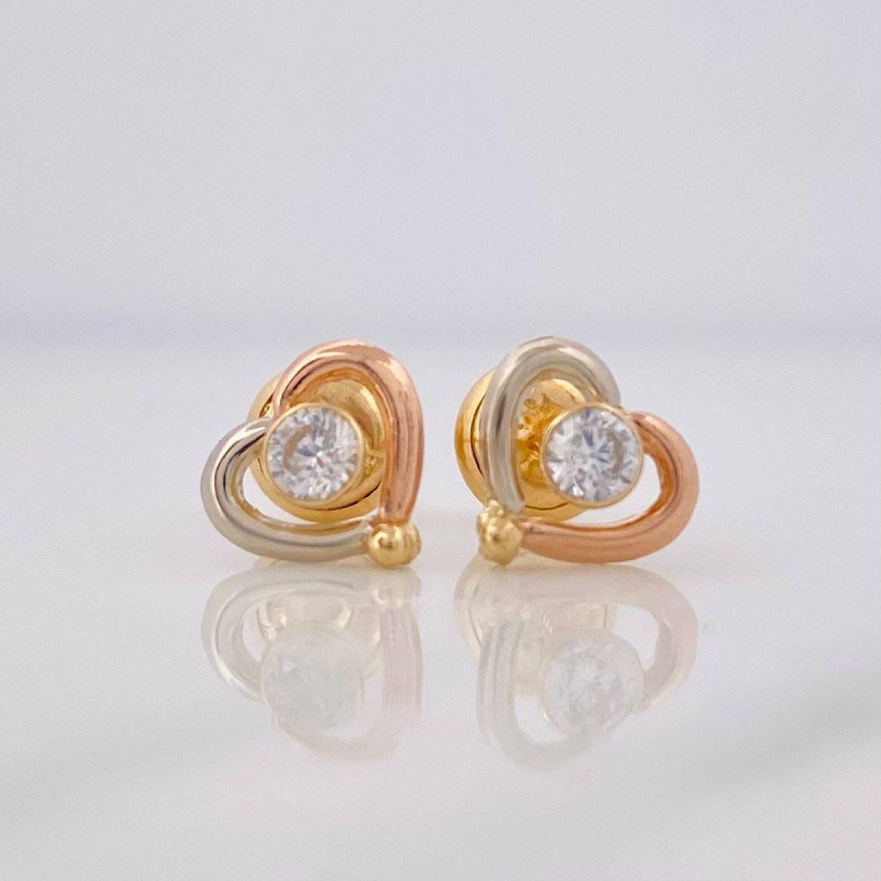 Topos Corazon 0.9g / 7.7mm Tres Oros 18K