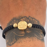 Pulsera Tejida Negra Fe 1.4gr / 6mm Oro Amarillo 18K %