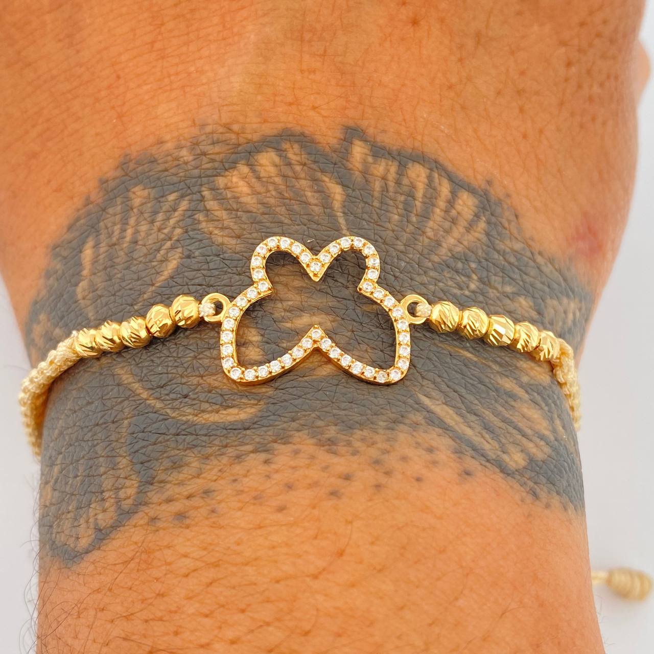 Pulsera Tejida Beige Silueta Mariposa 1.45gr / 3mm Oro Amarillo 18K %