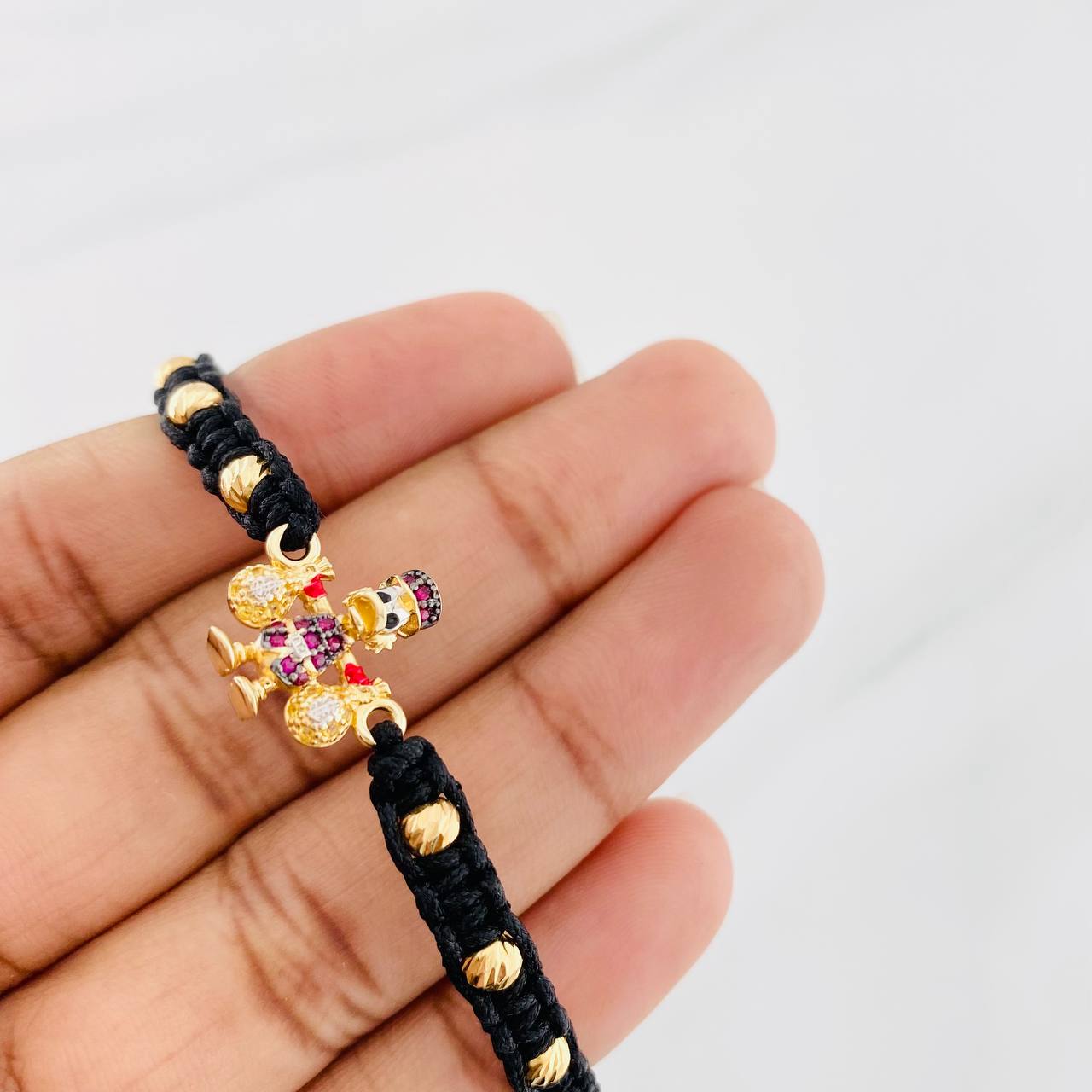 Pulsera Tejida Negra Pato Bolsas Dinero Oro Amarillo 18K