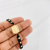 Pulsera Tejida Negra Placa Cuadrada Punteada Oro Amarillo 18K