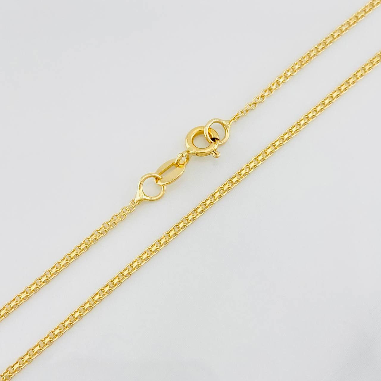 Cadena China 3.3g / 60cm / 1.4mm Oro Amarillo 18K