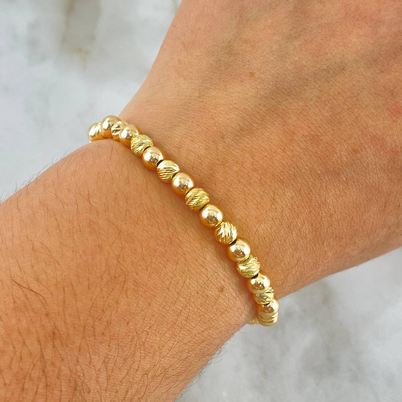 Pulsera Linea Continua 4.25gr / 5mm Bolas Lisas Diamantadas Satinadas 23 und Oro Amarillo *