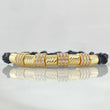 Pulsera Negra Herraje Rueda Triple Circones Blancos 6.1gr / 6mm Cilindros Diamantados 5und Oro Amarillo 18K ©