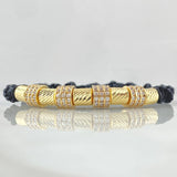Pulsera Negra Herraje Rueda Triple Circones Blancos 6.1gr / 6mm Cilindros Diamantados 5und Oro Amarillo 18K ©