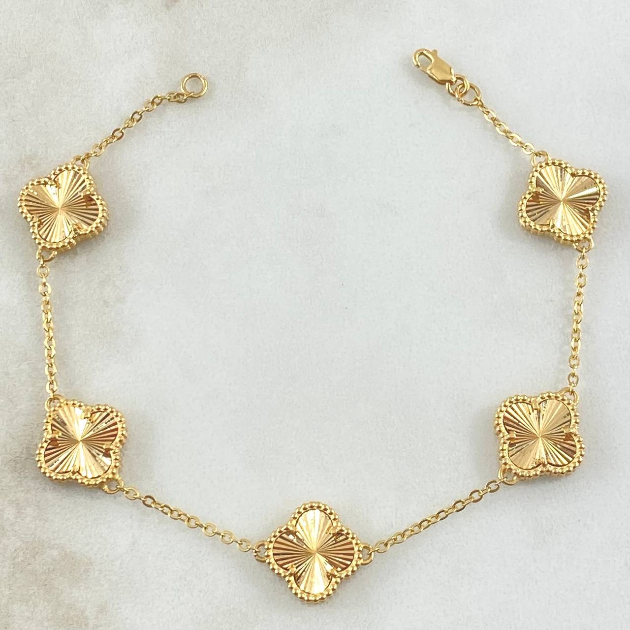 Pulso Aro Seguido Treból VCyA 8.4gr / 19.5cm / 1.5mm Diamantado Punteado 5und Oro Amarillo Nac.Esp. 18K ©
