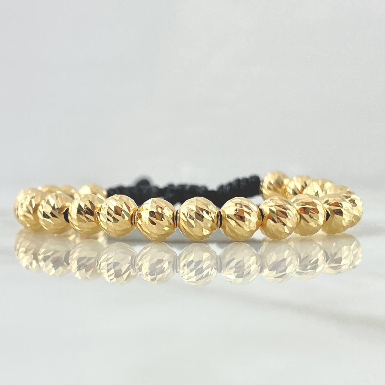 Pulsera Negra Bolas 3.65gr / 6mm Bolas Diamantadas 20und Oro Amarillo 18K ©