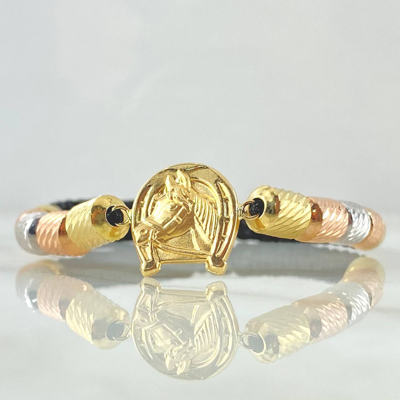 Pulsera Negra Herraje Caballo 4gr / 6mm Cilindros Diamantados 10und Tres Oros 18K ©