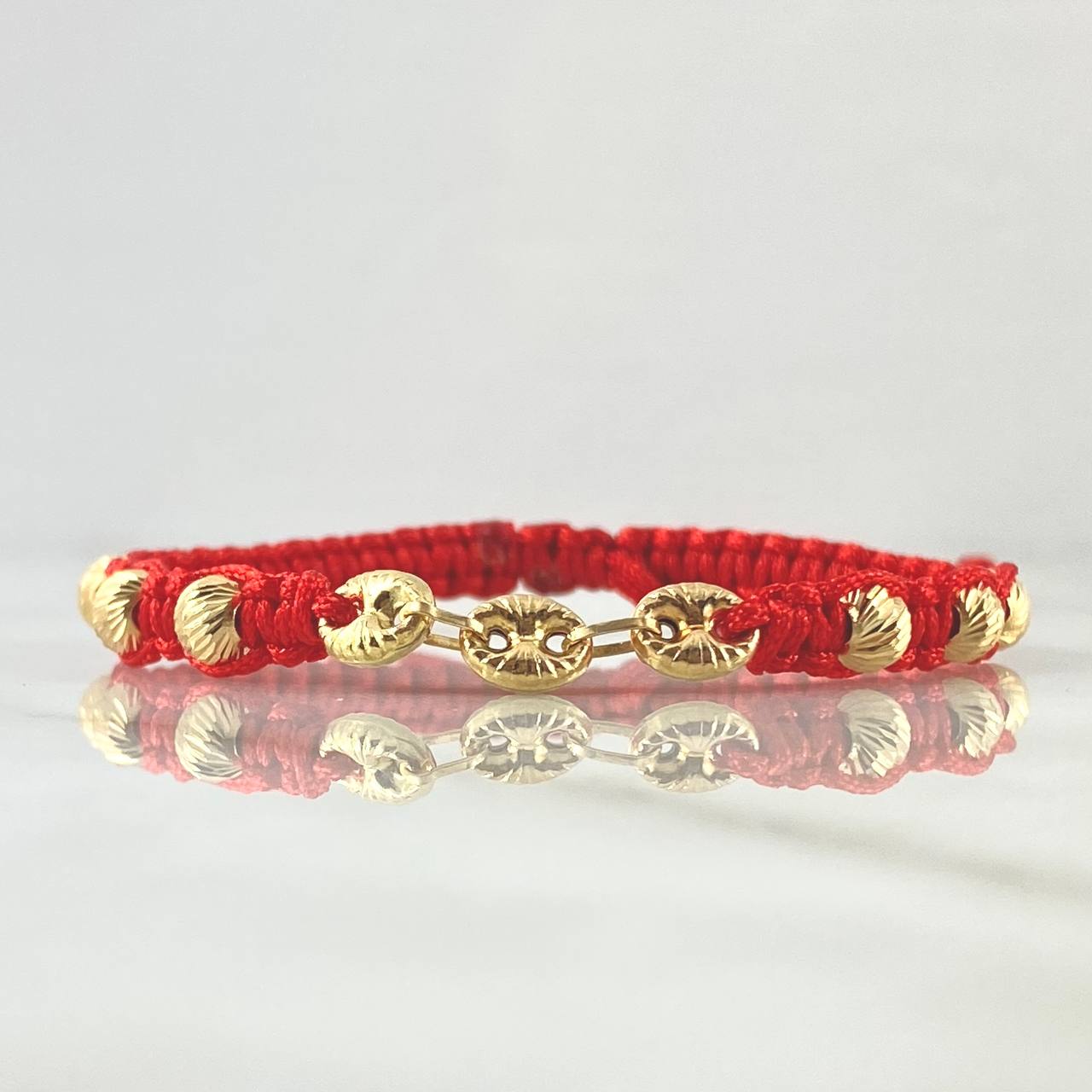 Pulsera Roja Retazo GC Diamantado 1.15gr / 5mm Bolas Diamantadas 6und Oro Amarillo 18K ©