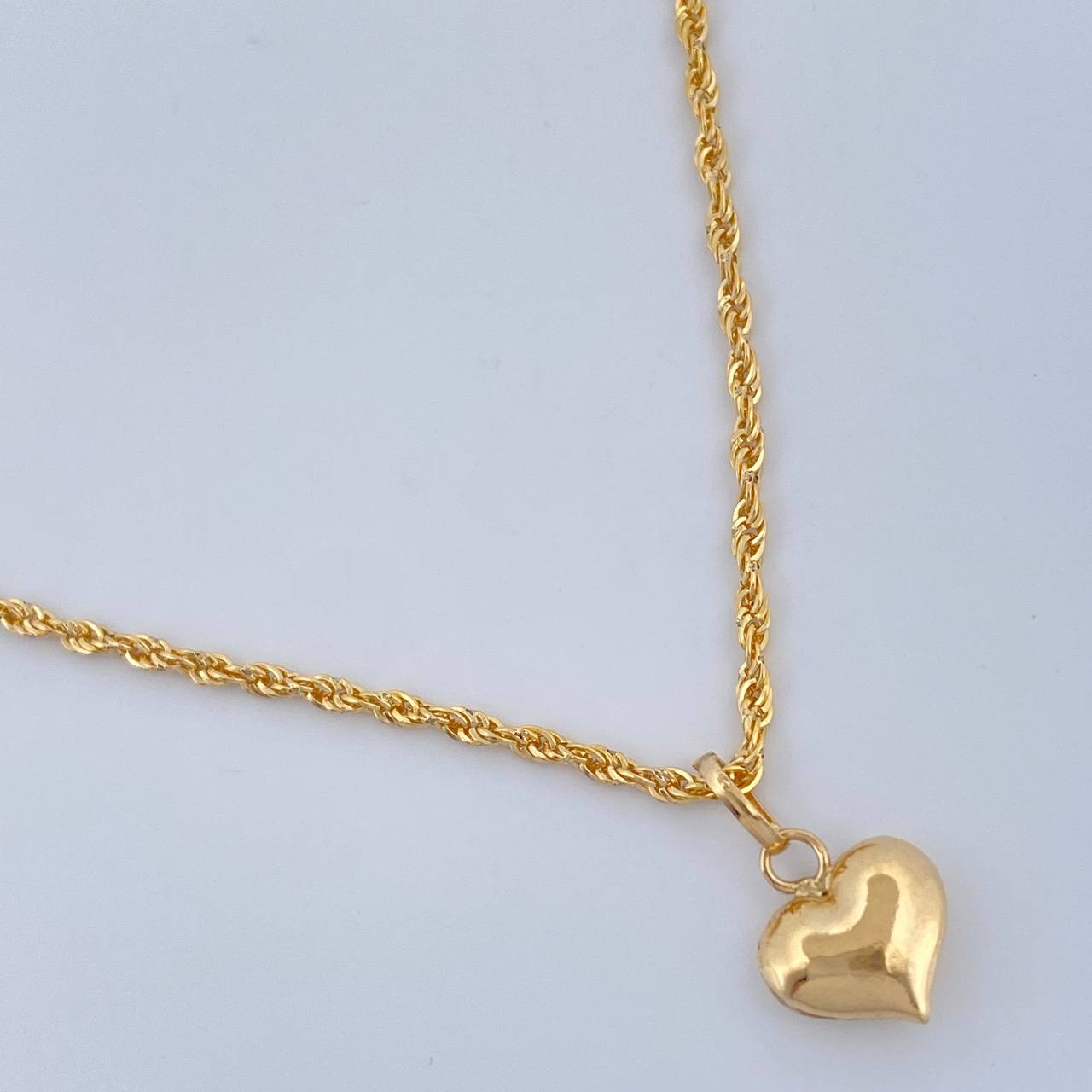 Set Cadena y Dije Lazo + Corazon 1.35gr / 40cm / Oro Amarillo 18K (Oferta) $