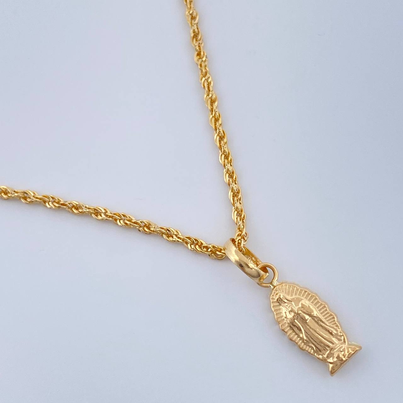 Set Cadena y Dije Lazo + Virgen De Guadalupe 1.5gr / 40cm / Oro Amarillo 18K (Oferta) $