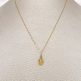 Set Cadena y Dije Flor Espejo + San Miguel 0.65gr / 44.5cm / Oro Amarillo 18K $