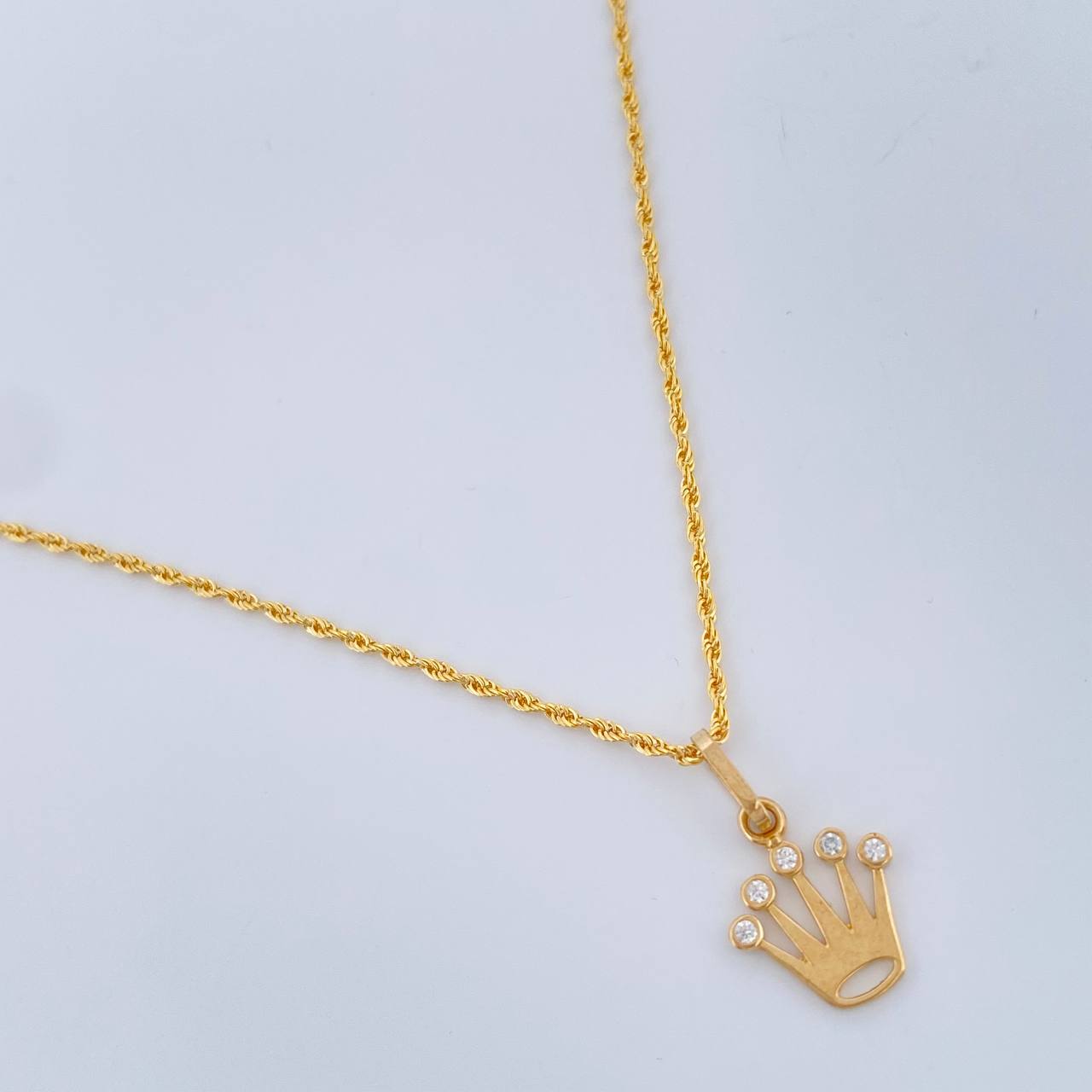 Set Cadena y Dije Lazo + Corona Rx 1.65gr / 45cm / Oro Amarillo 18K (Oferta) $
