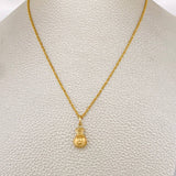Set Cadena y Dije Lazo + Bolsa De Dinero 1.35gr / 45cm / Oro Amarillo 18K (Oferta) $