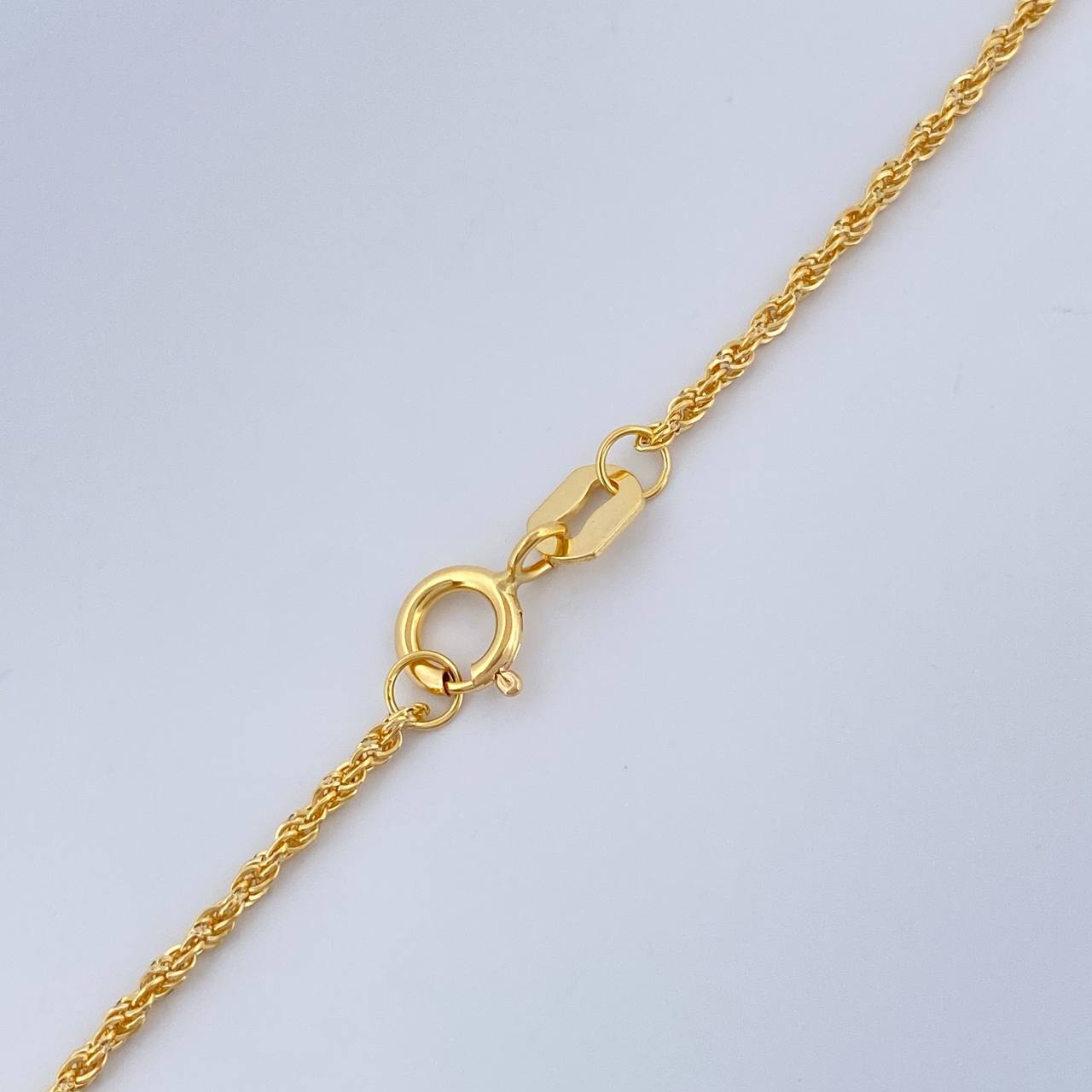 Set Cadena y Dije Lazo + Cruz 1.3gr / 45cm / Oro Amarillo 18K (Oferta) $
