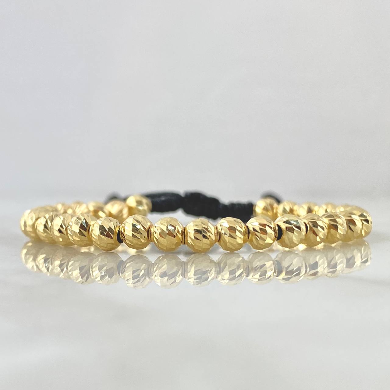 Pulsera Negra Bolas 4.15gr / 5mm Diamantadas 30und Oro Amarillo 18K ©