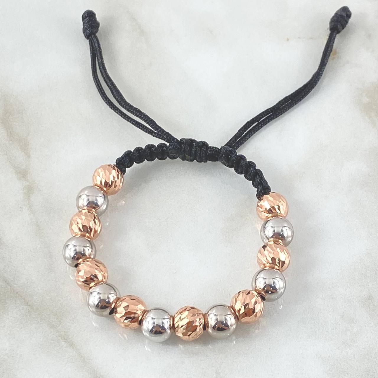Pulsera Negra Bolas 5gr / 8mm Diamantadas 8und - Lisas 7und Dos Oros Blanco Rosa 18K ©