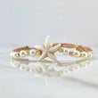 Pulsera Beige Estrella De Mar 0.45gr / 3mm Bolas Diamantadas 8und Oro Amarillo 18K (A.C)