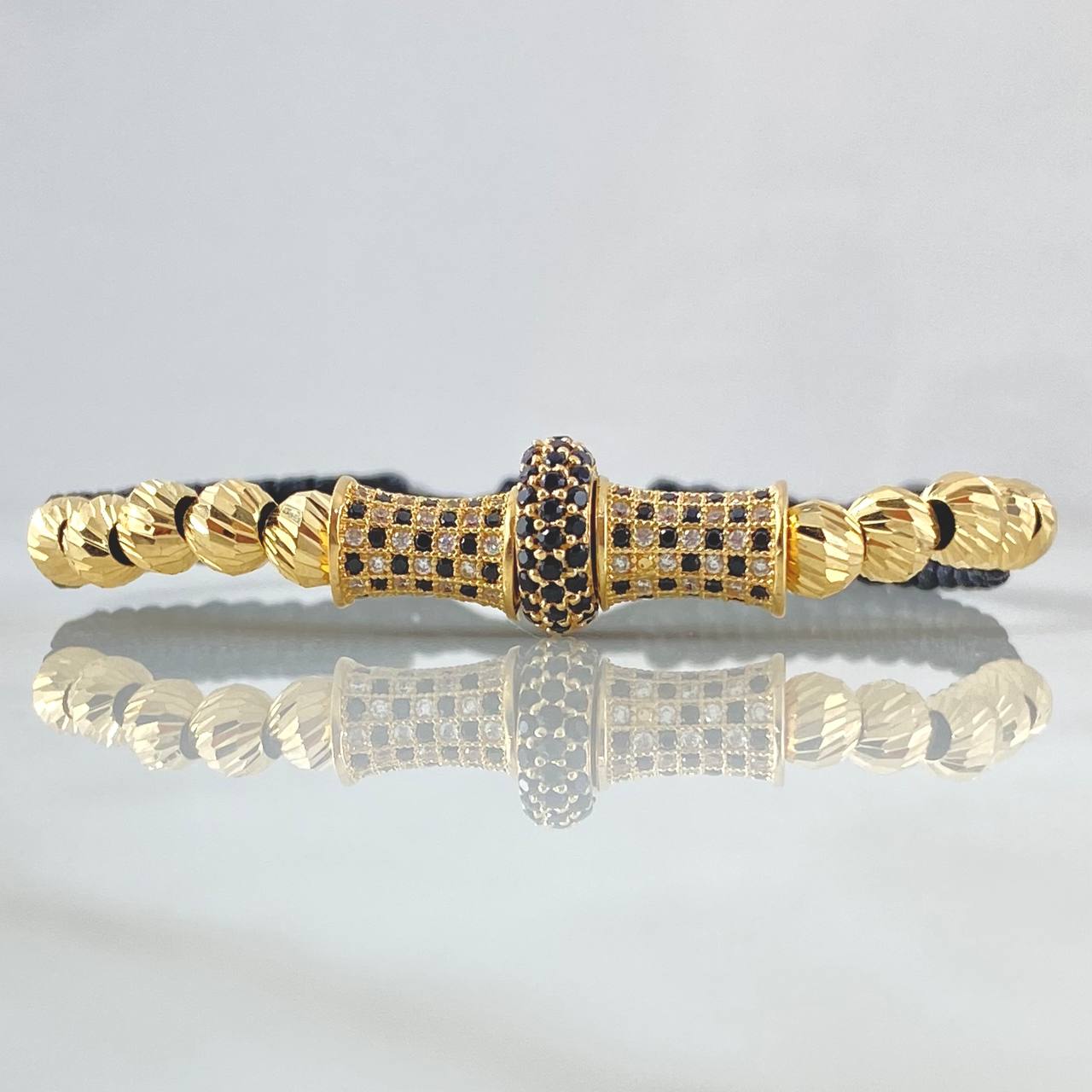 Pulsera Negra Herraje Rueda Cilindro 5.4gr / 5mm Bolas Diamantadas 10und Circones Blancos Negros Oro Amarillo 18K