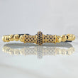 Pulsera Negra Herraje Rueda Cilindro 5.4gr / 5mm Bolas Diamantadas 10und Circones Blancos Negros Oro Amarillo 18K