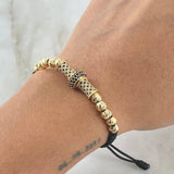 Pulsera Negra Herraje Rueda Cilindro 5.4gr / 5mm Bolas Diamantadas 10und Circones Blancos Negros Oro Amarillo 18K