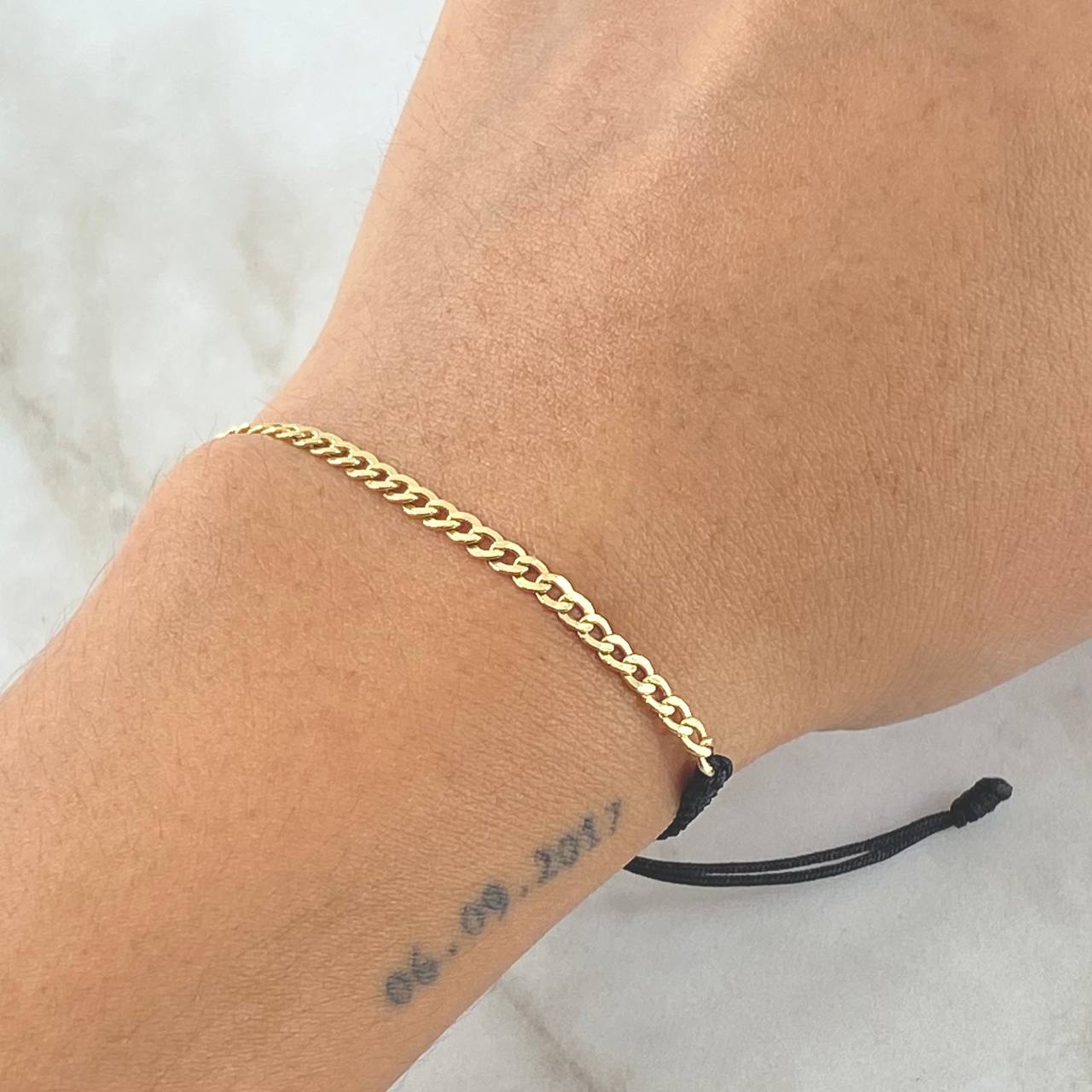 Pulsera Negra Retazo Cubano 0.6gr / 2.8mm Oro Amarillo +1  18K