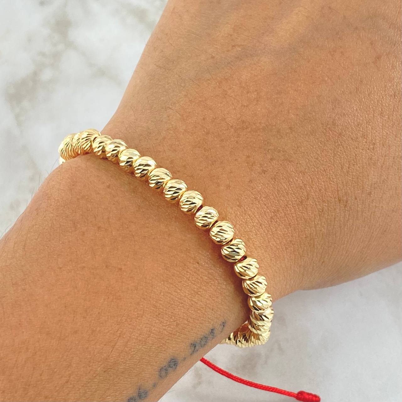 Pulsera Roja Bolas 5gr / 5mm Diamantadas 35und Oro Amarillo 18K ©