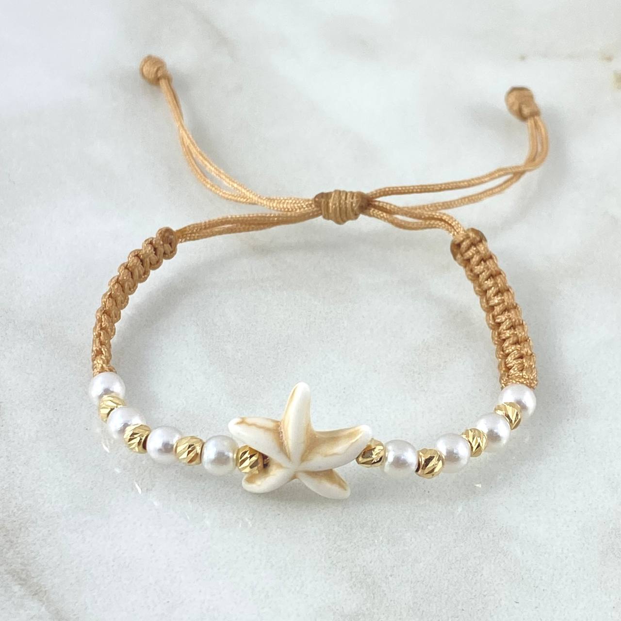 Pulsera Beige Estrella De Mar 0.45gr / 3mm Bolas Diamantadas 8und Oro Amarillo 18K (A.C)